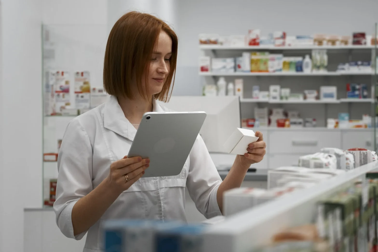 Clinical pharmacist using digital tools to review medications, improve treatment outcomes, and support comprehensive pharmacy care services for patients