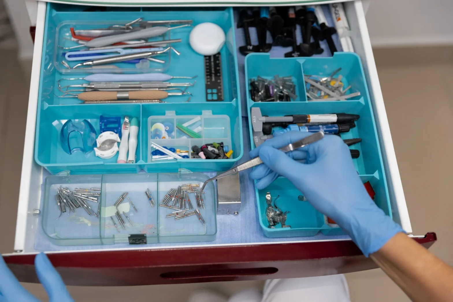 Medical supply pharmacy equipment and dental tools organized in storage drawer for clinical use in Jacksonville