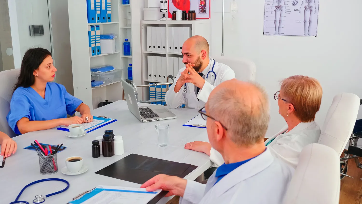 Healthcare professionals collaborating on patient care plans, showcasing integrated medical pharmacy Jacksonville services that support better outcomes and reduce hospital readmissions