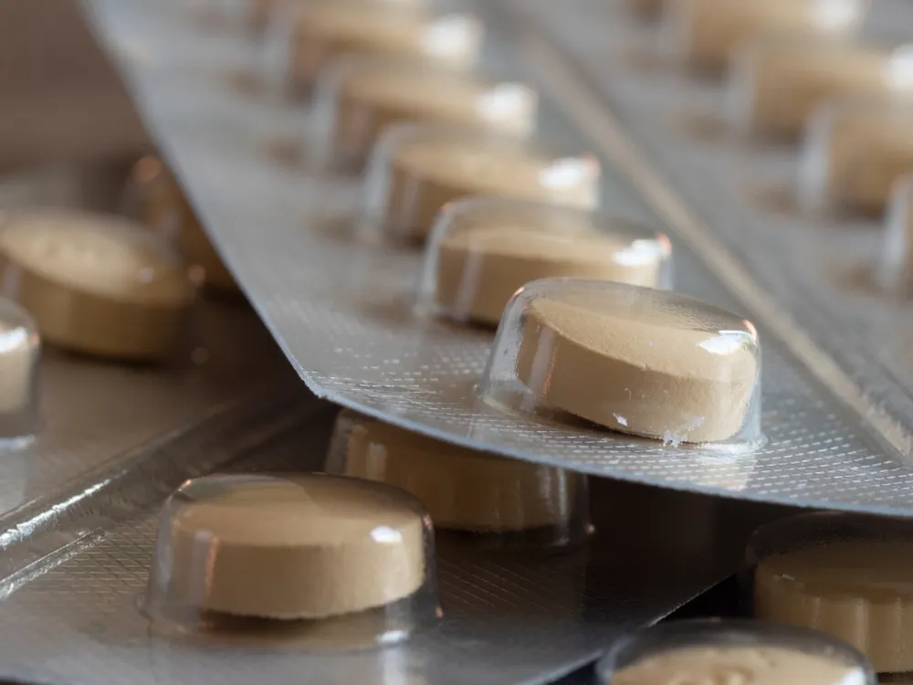 Illustration showing patient-focused pharmaceutical care aimed at improving treatment outcomes and medication adherence