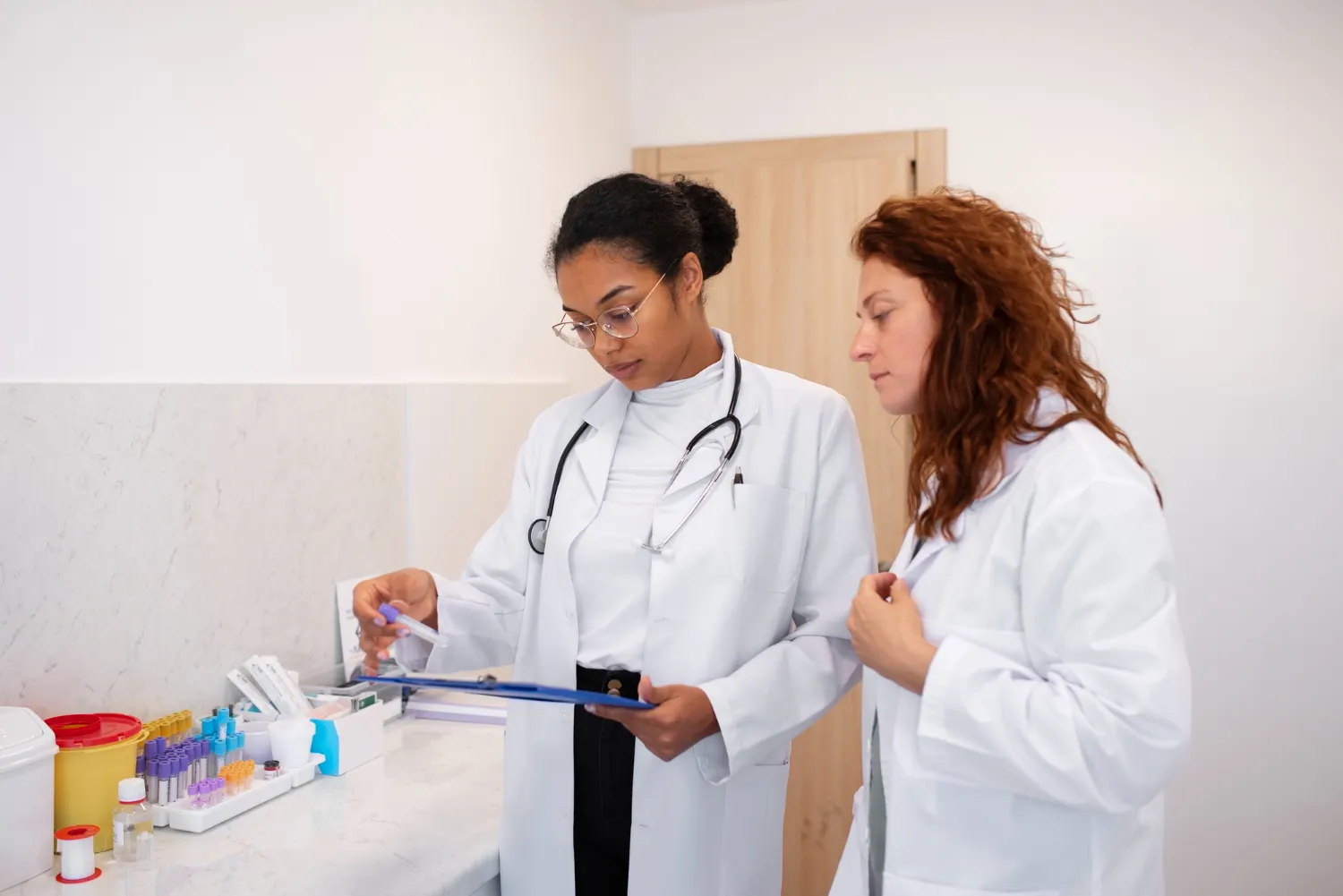 Healthcare professional reviewing wound care medication and dressing supplies to support chronic and diabetic wound treatment